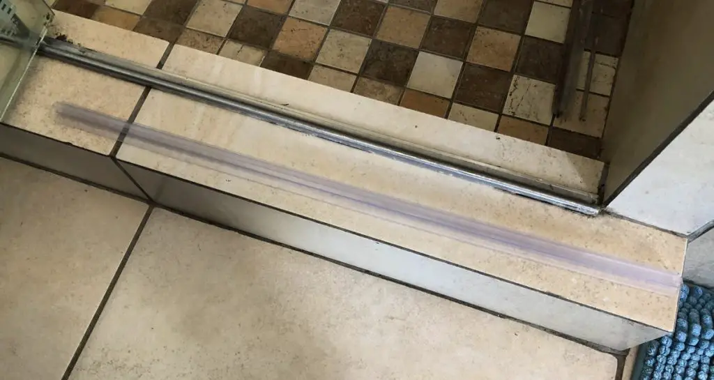 How To Replace Your Shower Door Seals - The DIY Life