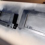 Spraying Components With Black Spray Paint