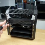 Screwing Power Supply Shelf Into Place